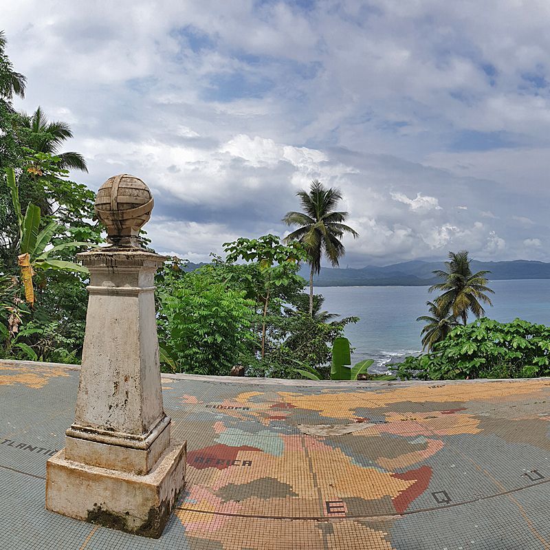 Ilhéu das Rolas in São Tomé and Príncipe is captured in this stunning travel photograph, showcasing the small island surrounded by the turquoise waters of the Atlantic Ocean. White sandy beaches and lush tropical vegetation create a vibrant contrast against the deep blue sea, highlighting the island’s pristine and secluded character. Gentle waves lap at the shoreline, while the natural landscape emphasizes the island’s untouched beauty and sense of tranquility. This scene conveys the appeal of an intimate island escape, offering guests a serene retreat immersed in the spectacular scenery of São Tomé and Príncipe. Inspiration Africa specializes in bespoke, tailor-made journeys to São Tomé and Príncipe and across Africa, crafting unforgettable travel experiences in extraordinary destinations.