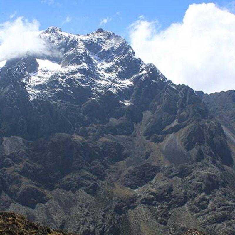 Hikers traverse the dramatic landscapes of the Rwenzori Mountains in Uganda, captured in this breathtaking adventure travel photograph. Known as the “Mountains of the Moon,” the Rwenzori feature jagged peaks, glaciers, and lush alpine vegetation, making them one of Africa’s most iconic and challenging trekking destinations. Trails wind through dense forests, bamboo zones, and high-altitude moorlands, offering panoramic views and opportunities to encounter unique flora and endemic wildlife. Ideal for adventure seekers, mountaineers, and nature enthusiasts, trekking the Rwenzori Mountains combines physical challenge with extraordinary scenery and immersive wilderness experiences. Inspiration Africa specializes in bespoke, tailor-made journeys to Uganda and across Africa, creating authentic, unforgettable hiking and adventure experiences in extraordinary destinations.
