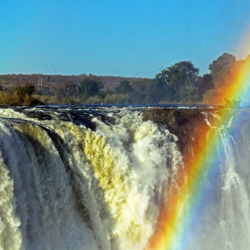 Behold the awe-inspiring Victoria Falls in Zimbabwe, where thundering waters create a brilliant rainbow in the mist. This iconic natural wonder showcases the power, beauty, and majesty of one of Africa’s most spectacular landscapes. Witnessing this breathtaking scene is a truly unforgettable experience. Let Inspiration Africa craft your bespoke, tailor-made journey to explore Victoria Falls and the surrounding Zimbabwean wilderness. Start planning your extraordinary adventure with us today!