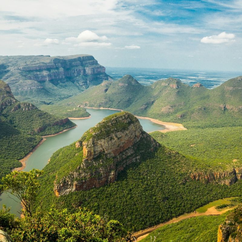 Experience the breathtaking beauty of South Africa with this stunning image of Blyde River Canyon. The photo captures the dramatic cliffs, lush greenery, and winding river below, highlighting one of the world’s largest and most spectacular canyons. The scene showcases the rich geological formations, vibrant vegetation, and panoramic vistas that make Blyde River Canyon a natural wonder and a must-see destination in South Africa.
Inspiration Africa crafts tailor-made journeys to South Africa, offering travellers the opportunity to explore Blyde River Canyon’s awe-inspiring landscapes, discover its hidden viewpoints, and immerse themselves in the extraordinary natural beauty and remarkable scenery of this iconic African destination.
