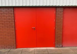 Twin red service doors