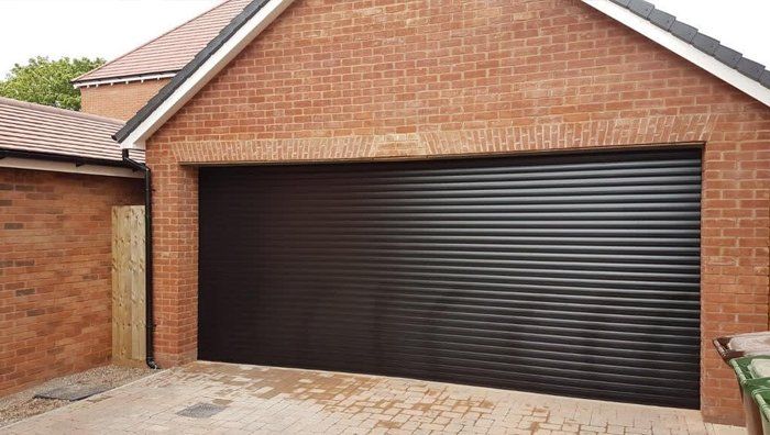 Single long black roller shutter door