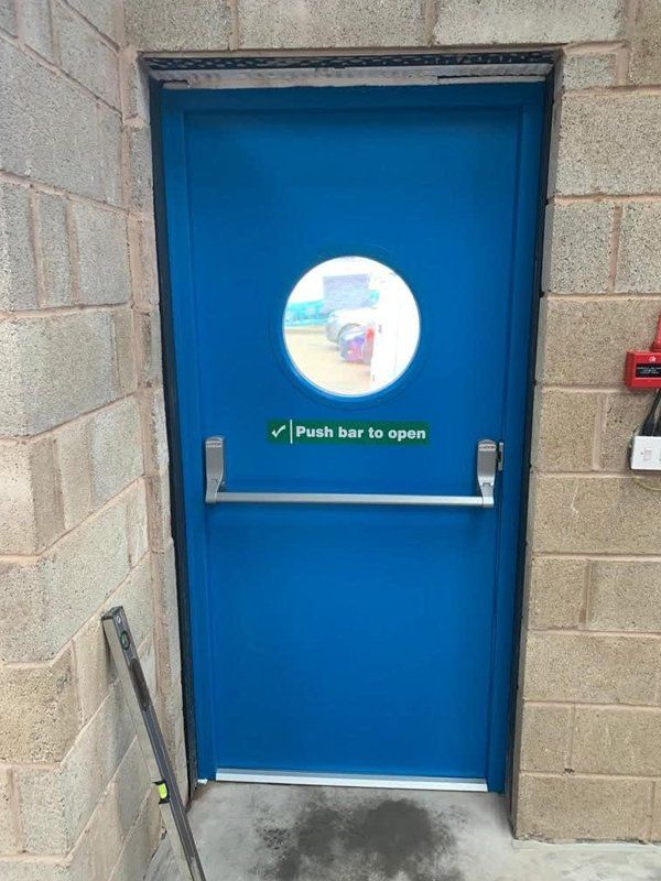 Blue fire exit door