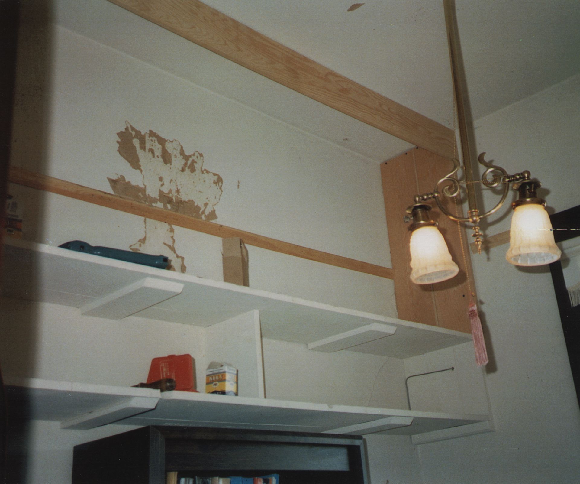 Garage Shelf With Ceiling Light — Oakland, CA — Gaslight Interiors
