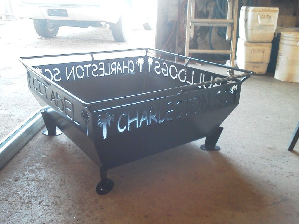 A fire pit with charleston written on it