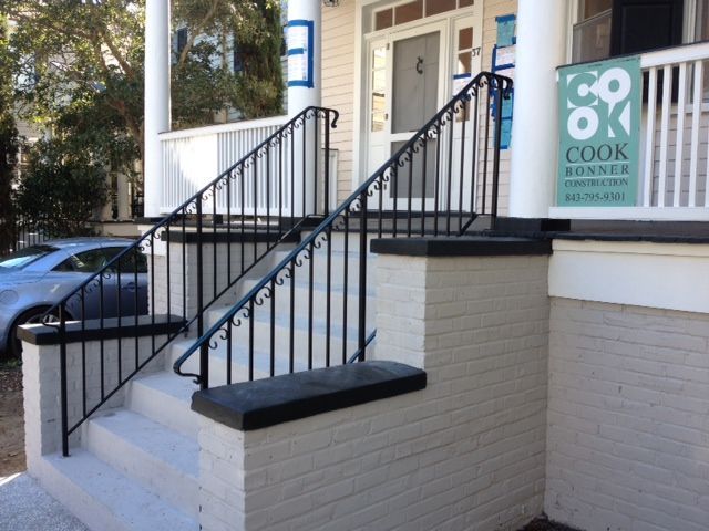 A staircase with a sign that says cook on it