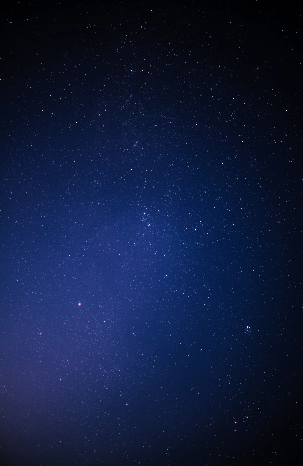 A dark blue night sky filled with lots of stars