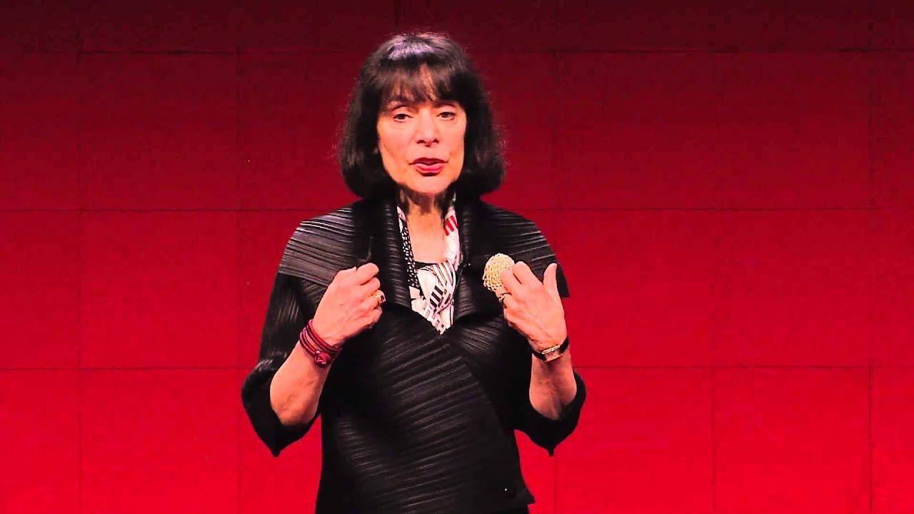 Carol Dweck speaking on stage