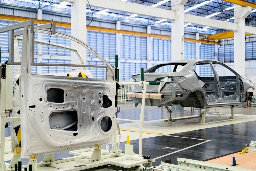 Car Manufacturing Plant Car Door and Chassis on Assembly Line — Ryder's Garage in Erina, NSW