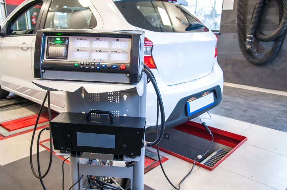 Car in A Service Bay with An Emissions Testing Machine — Ryder's Garage in MacMasters Beach, NSW
