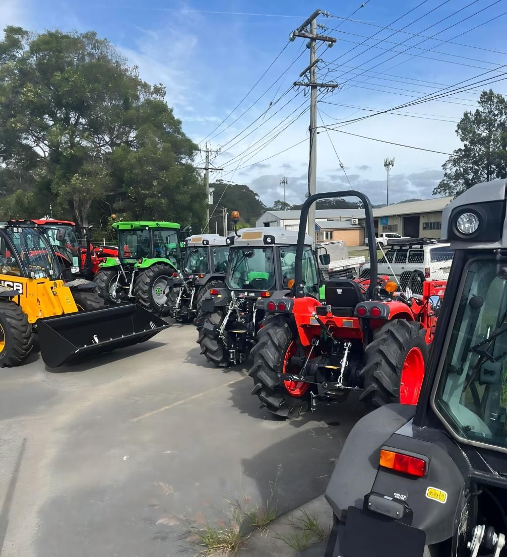 Row of New and Used Tractors