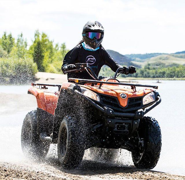 Man With Helmet Driving a Cforce 400 — North Coast Construction Equipment In Macksville, NSW