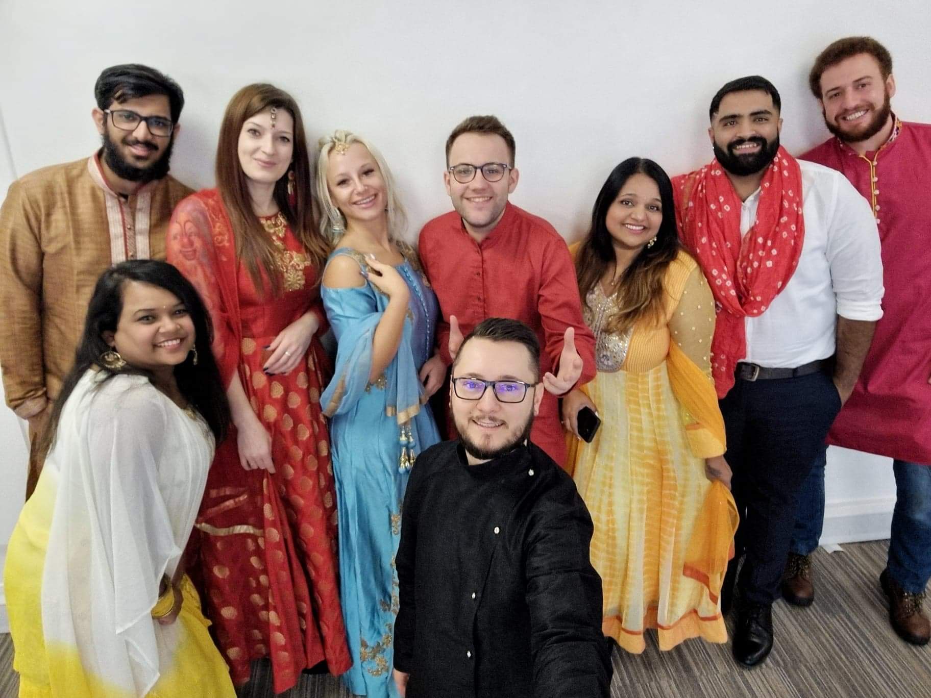 A group of people are posing for a picture together.