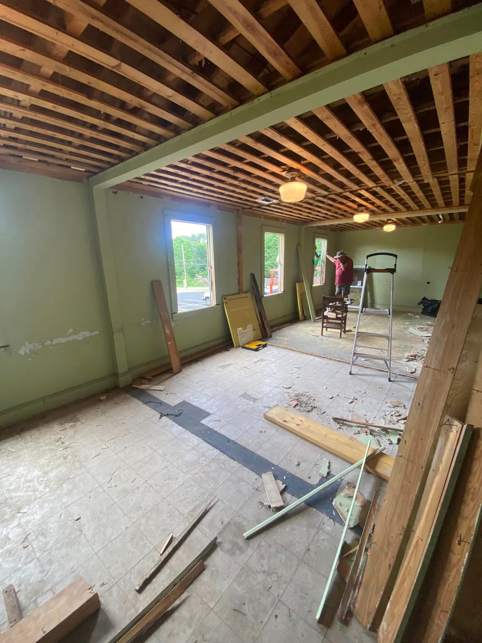 A room with a wooden ceiling and a lot of wood in it.