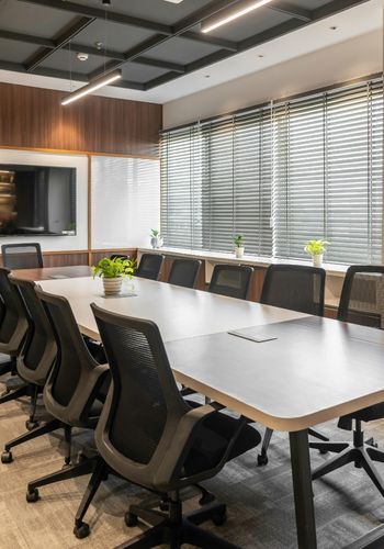 Image is of inside a boardroom setting - click to visit the flexible spaces services page