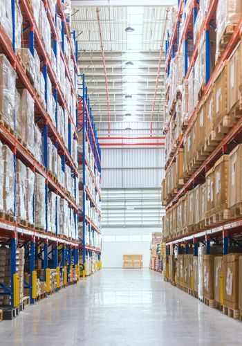 Image of a large commercial warehouse - click to visit the industrial services page