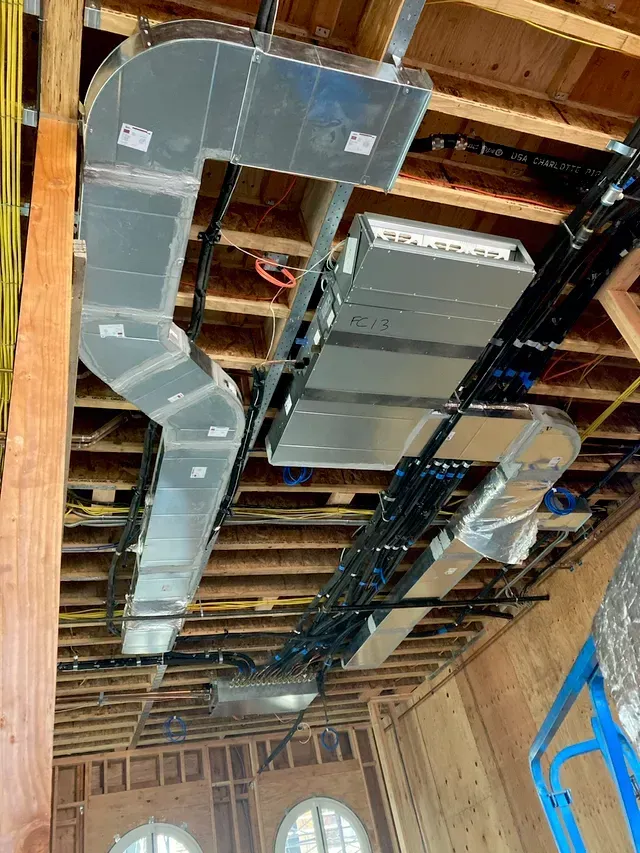 Completed central air conditioning installation for a residential property
