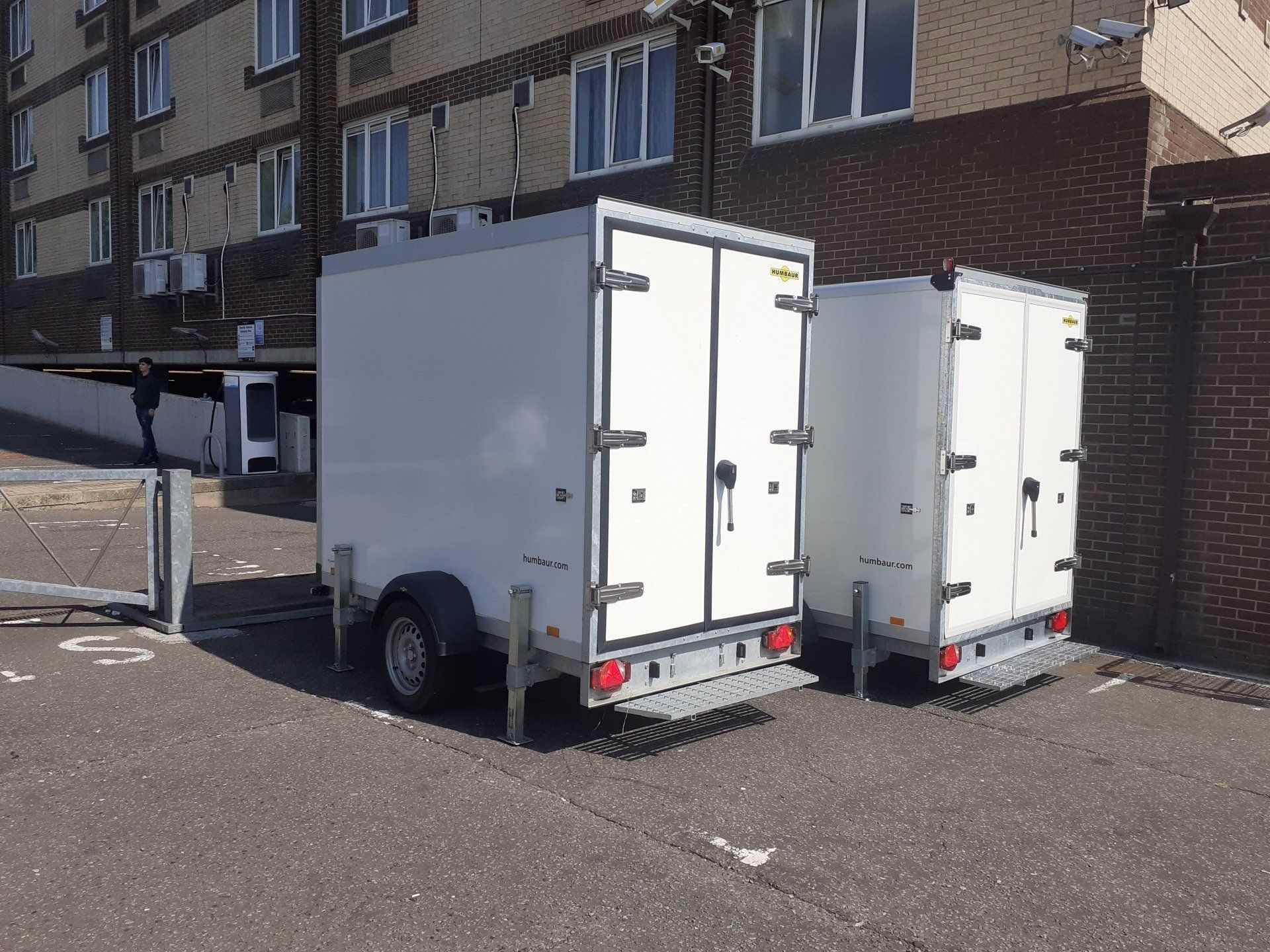 two white refrigerated trailers