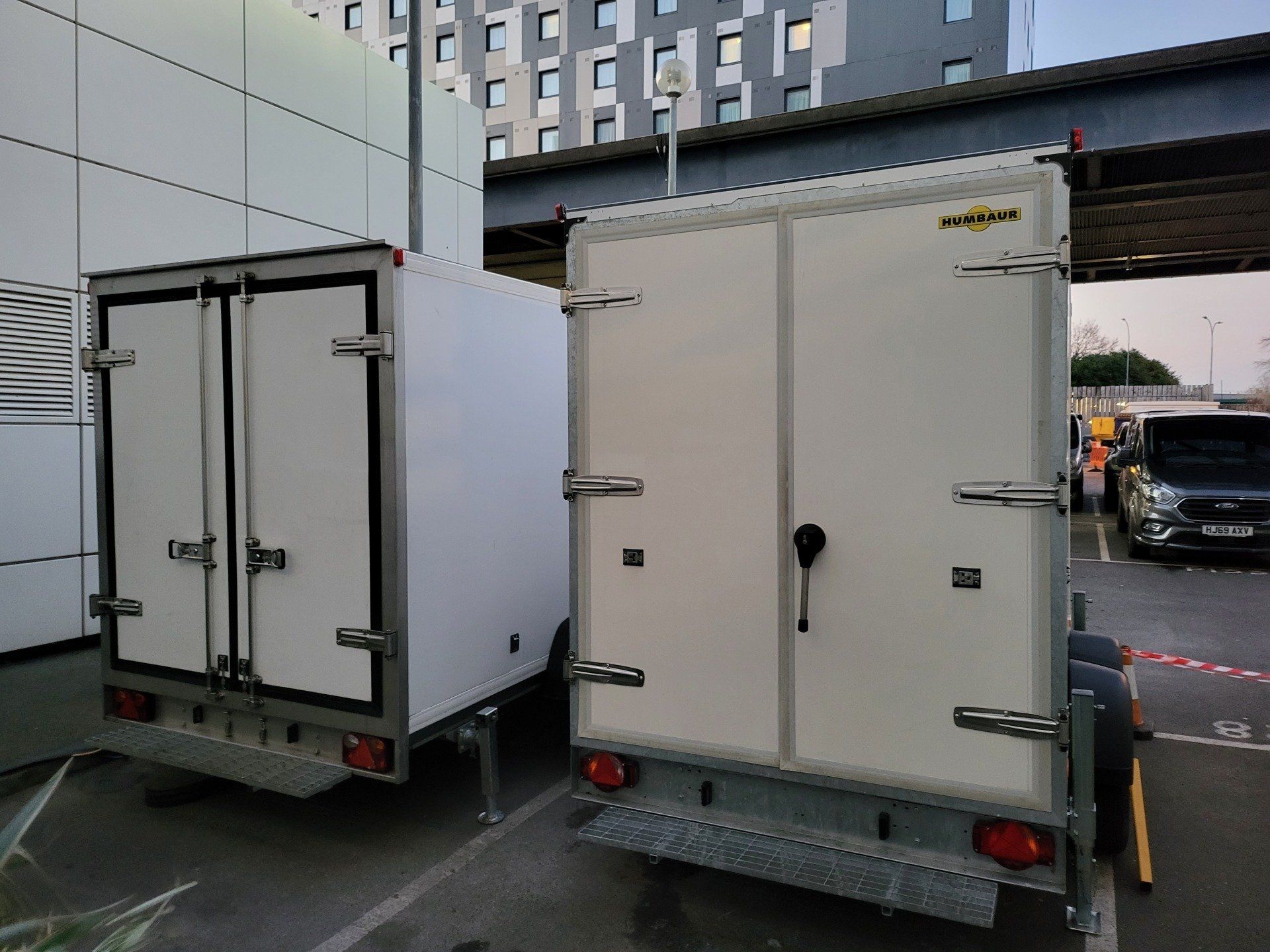 two large freezer trailers at gatwick airport