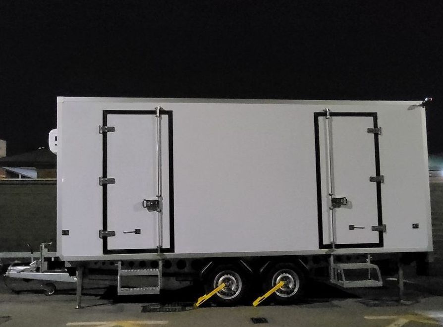 Split compartment freezer and freezer room