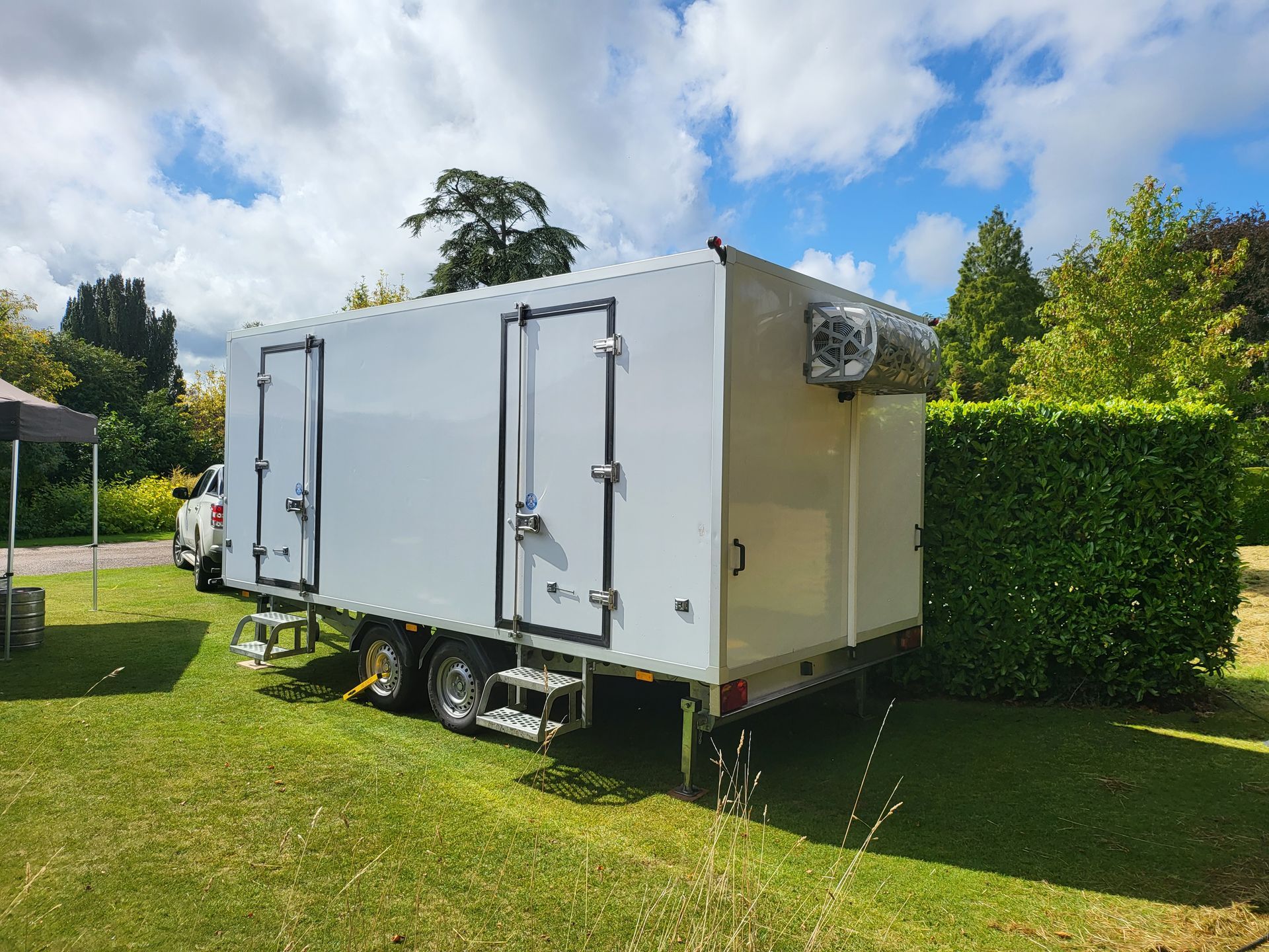 Split Compartment Fridge trailer set-up at a wedding