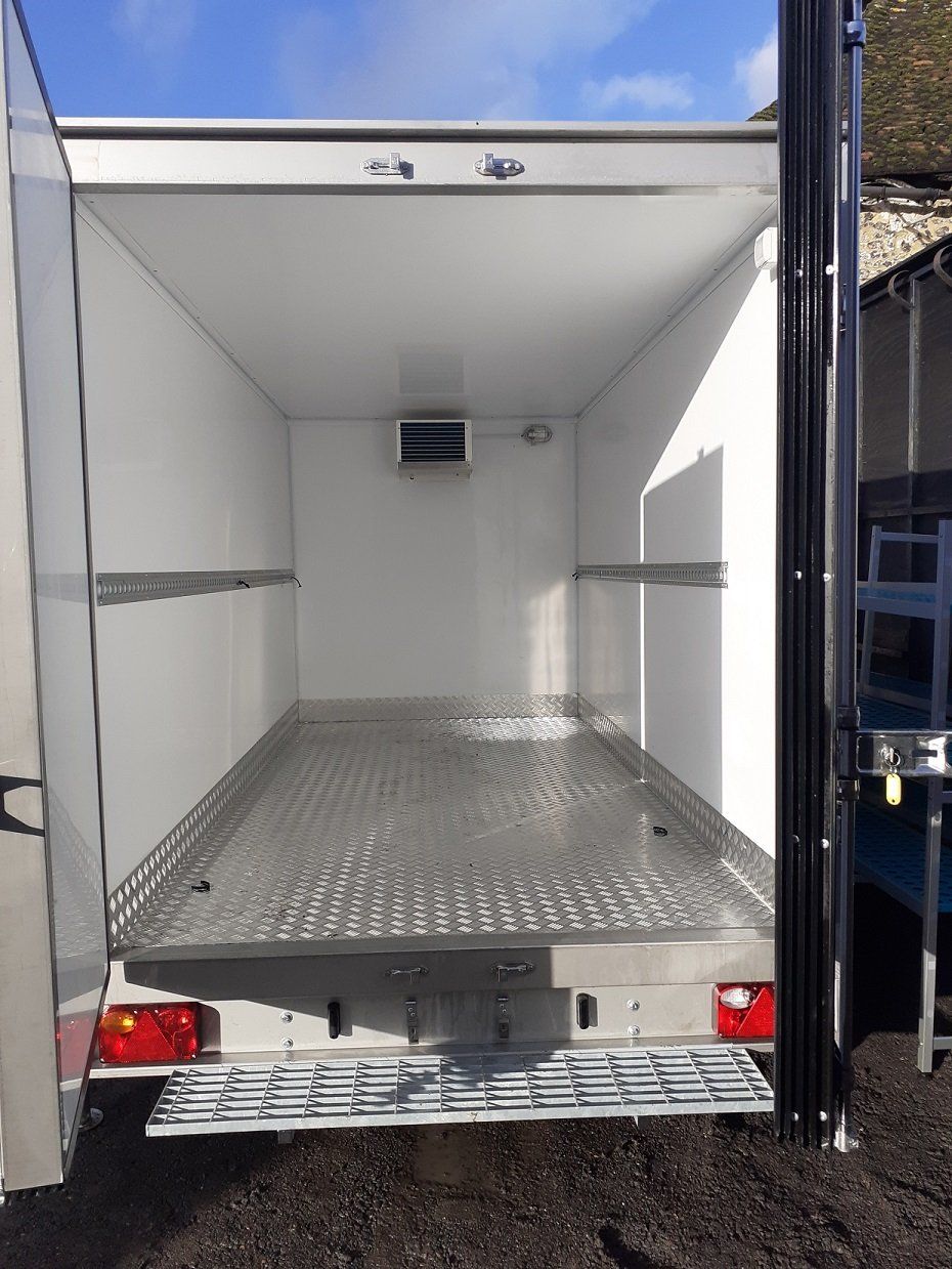 large freezer trailer with doors open