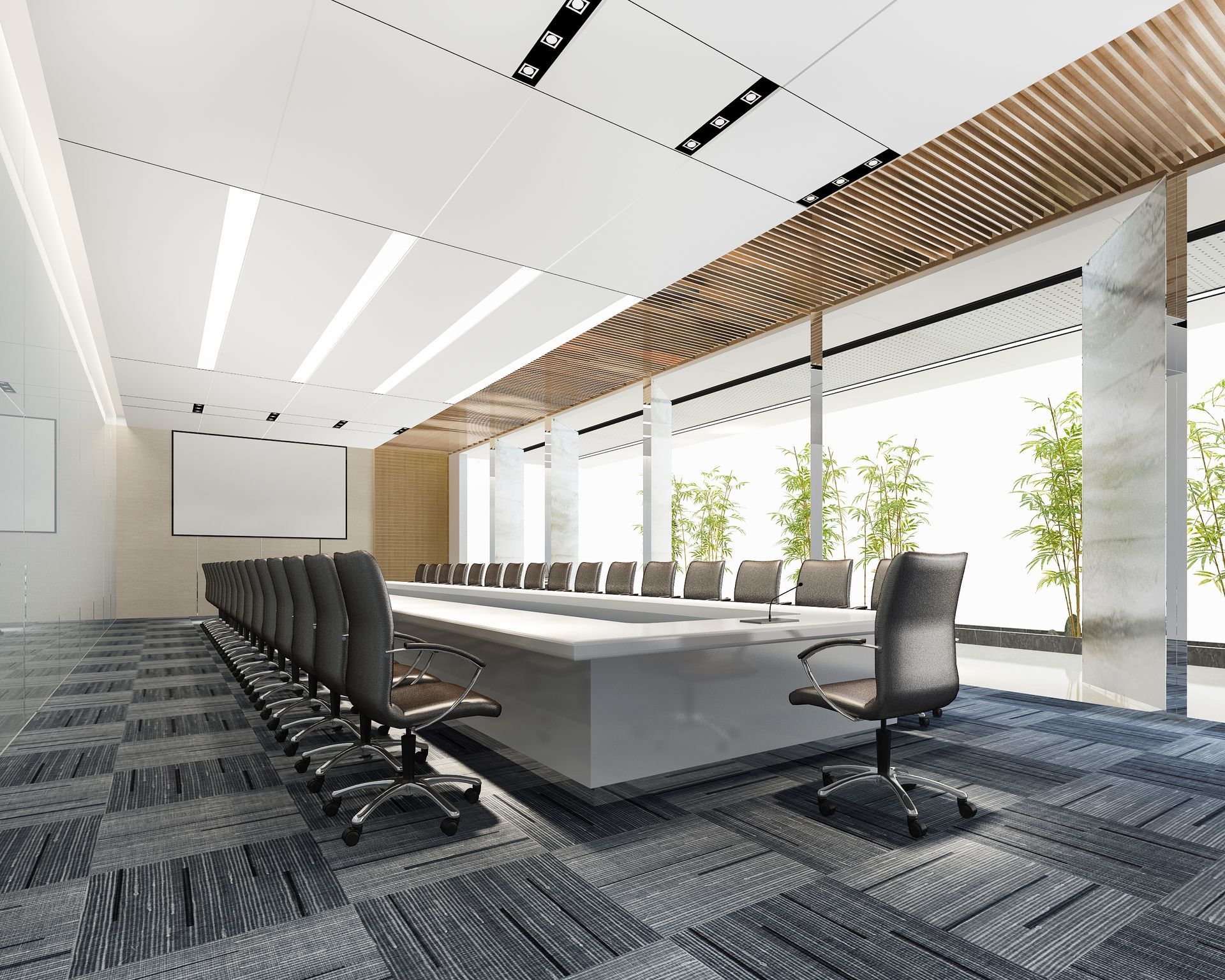Modern conference room with long table, black chairs, large windows, and patterned carpet