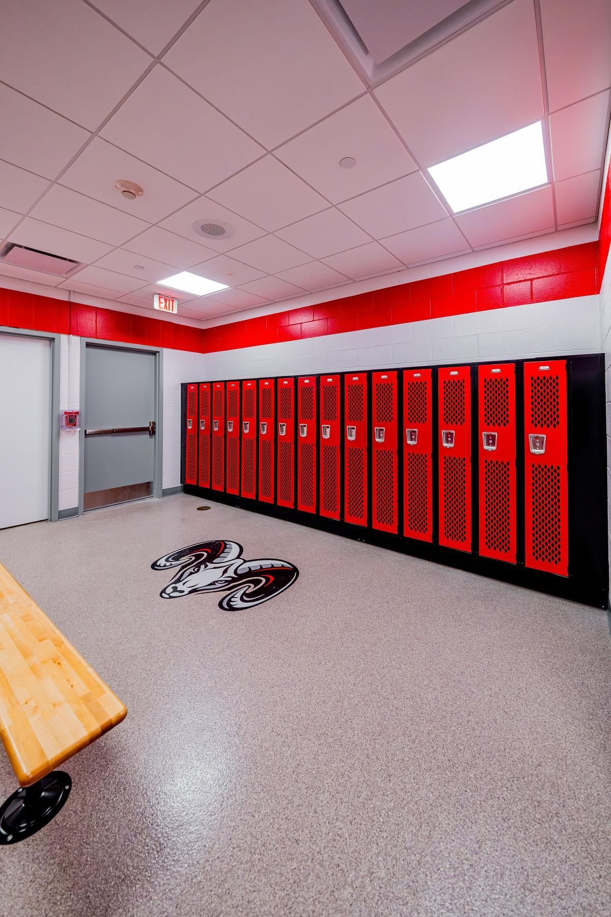 A large room with a long counter in the middle of it.