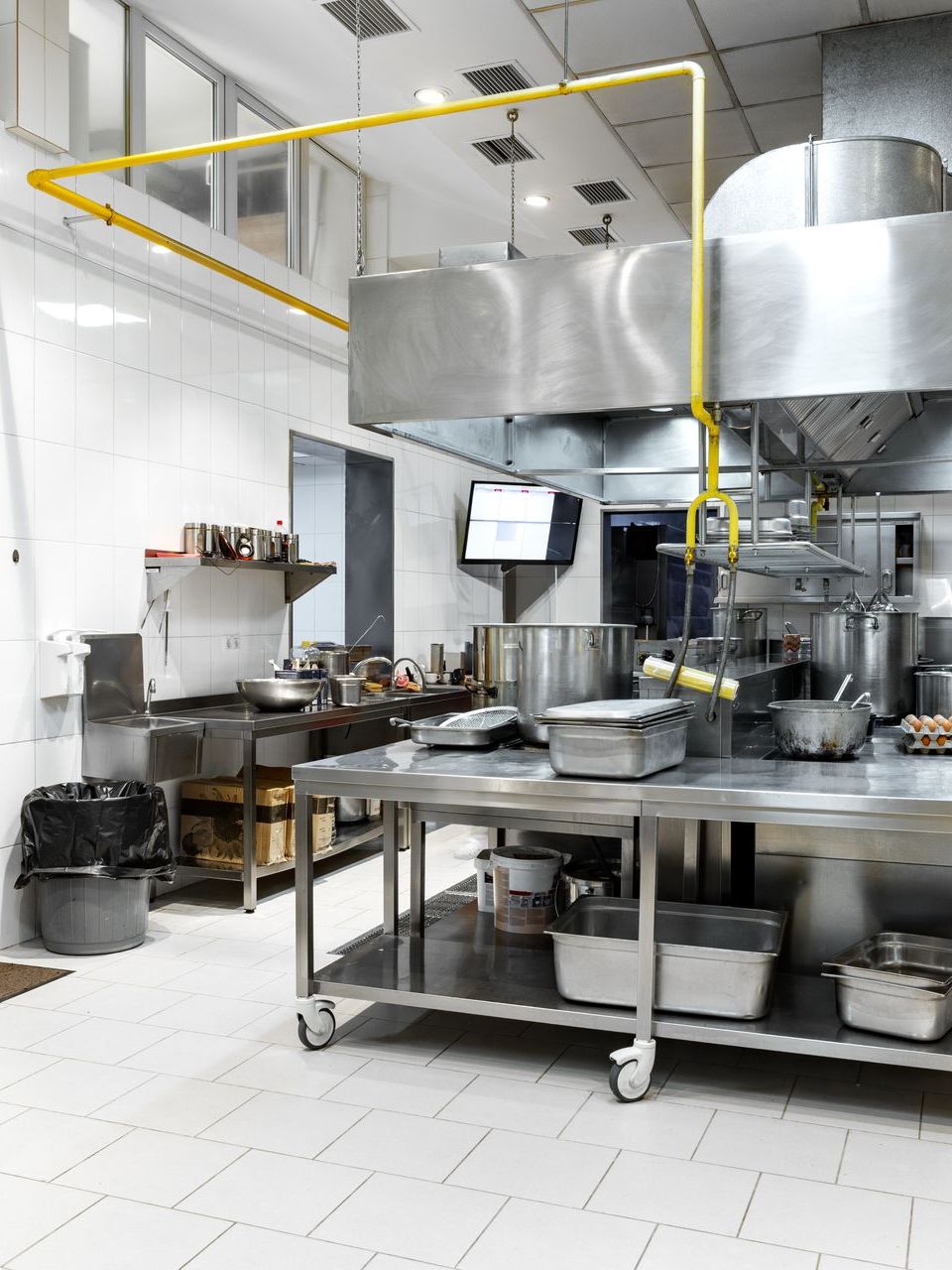 A kitchen with a lot of stainless steel appliances
