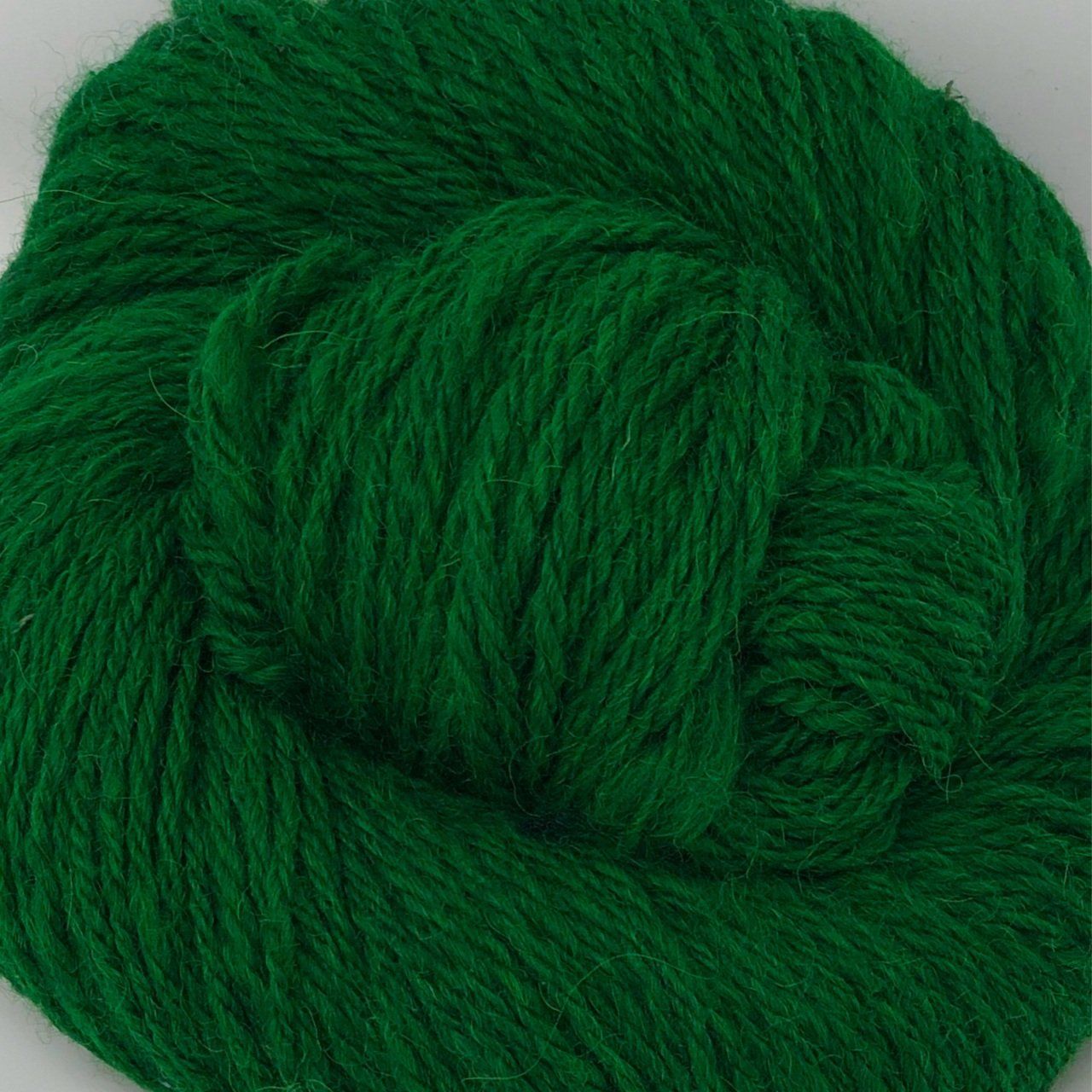 Ball of emerald green yarn.