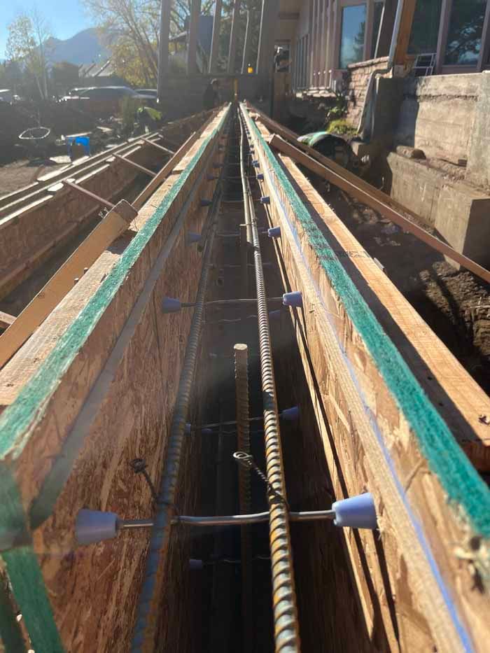 Wooden forms with rebar for concrete construction.