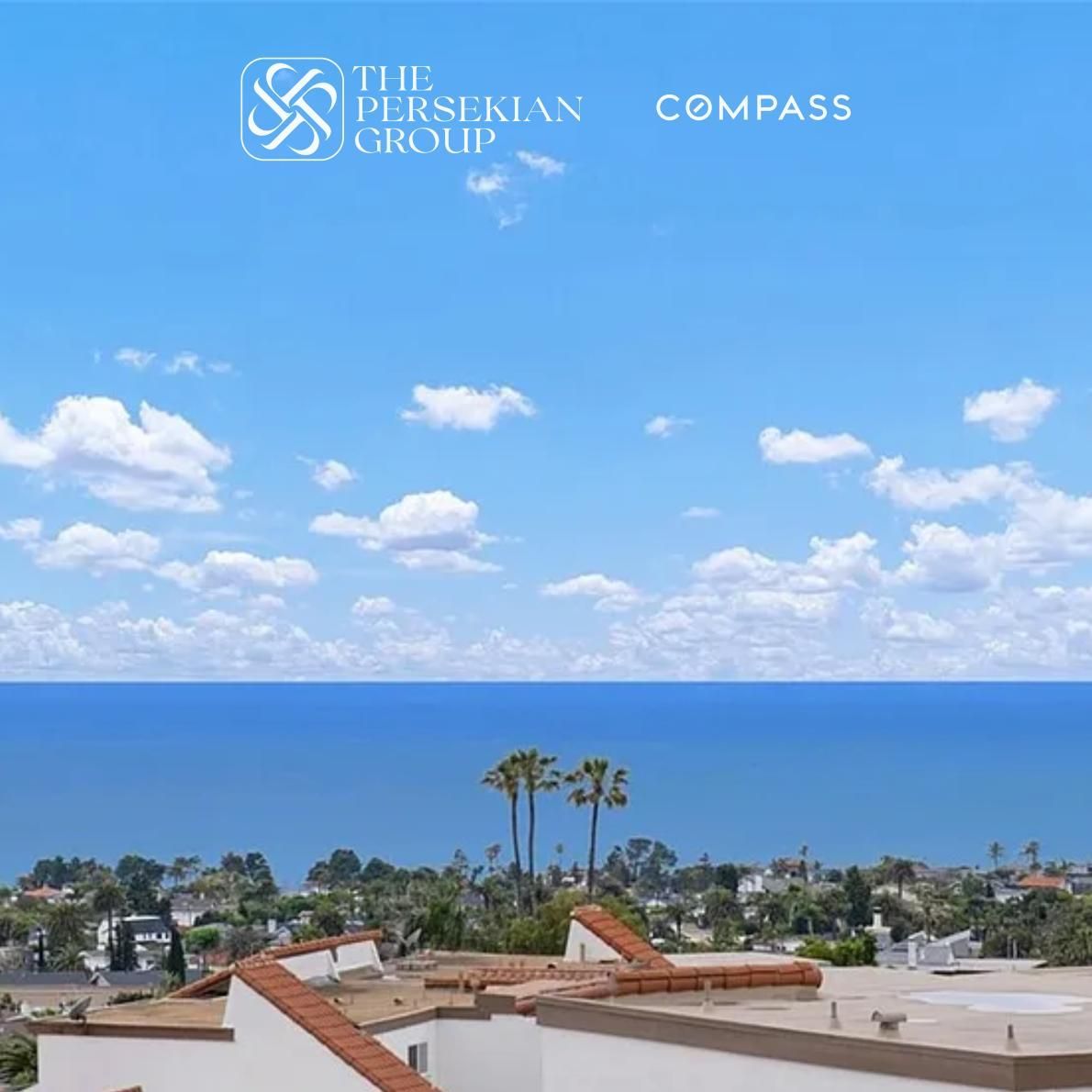 A scenic view of the ocean over neighborhood rooftops and palm trees in San Clemente, listed by Mania Persekian, REALTOR.