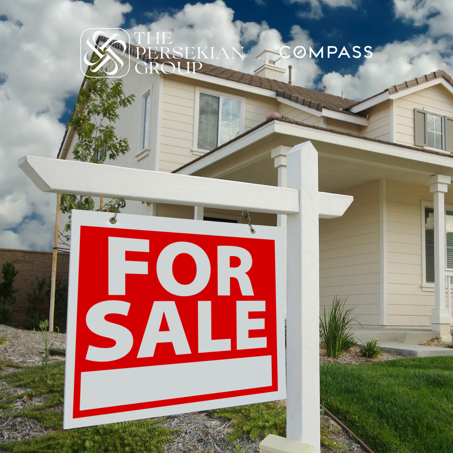 A 'For Sale' sign on the lawn of a modern two-story home.