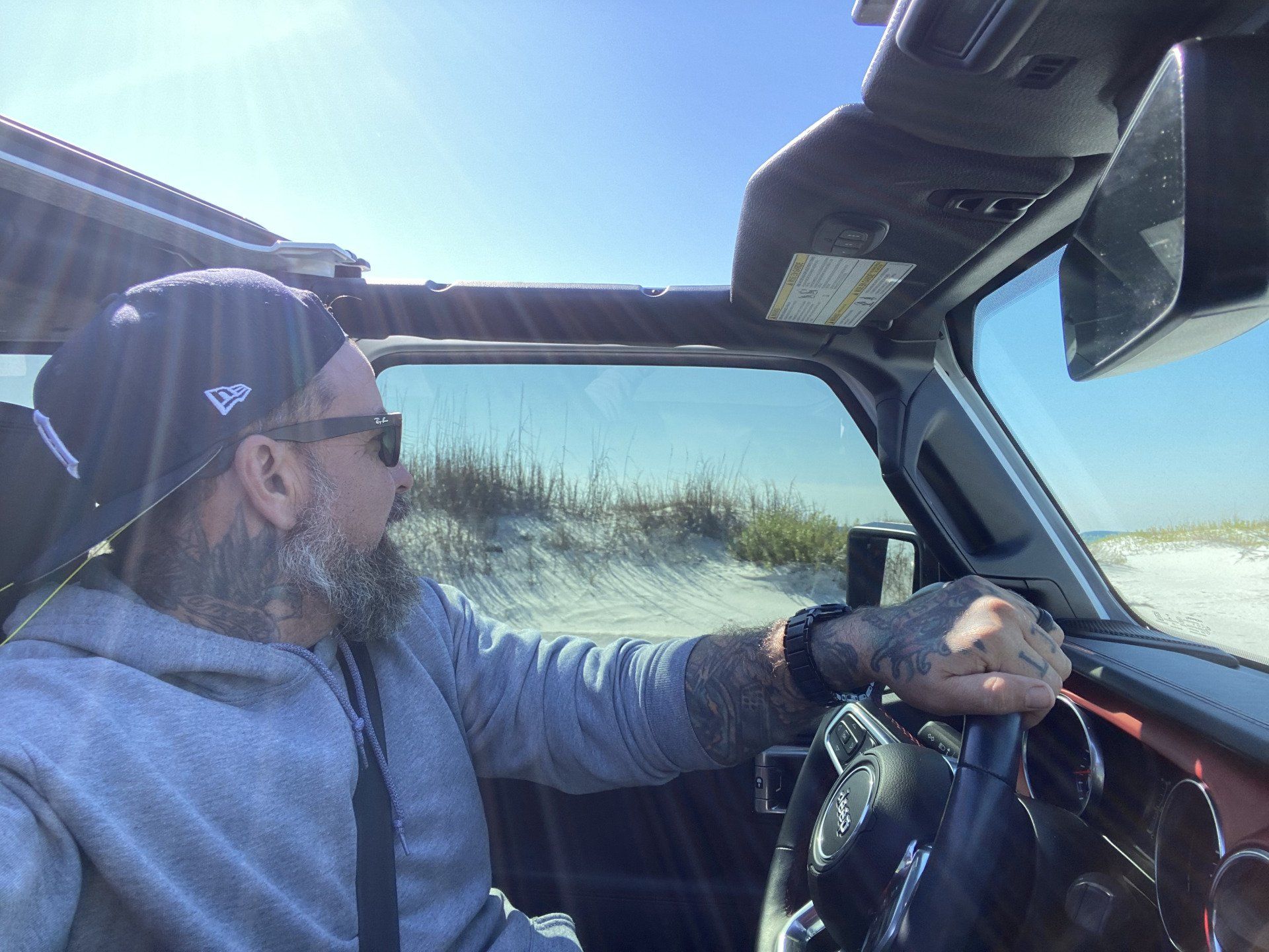 man driving in jeep