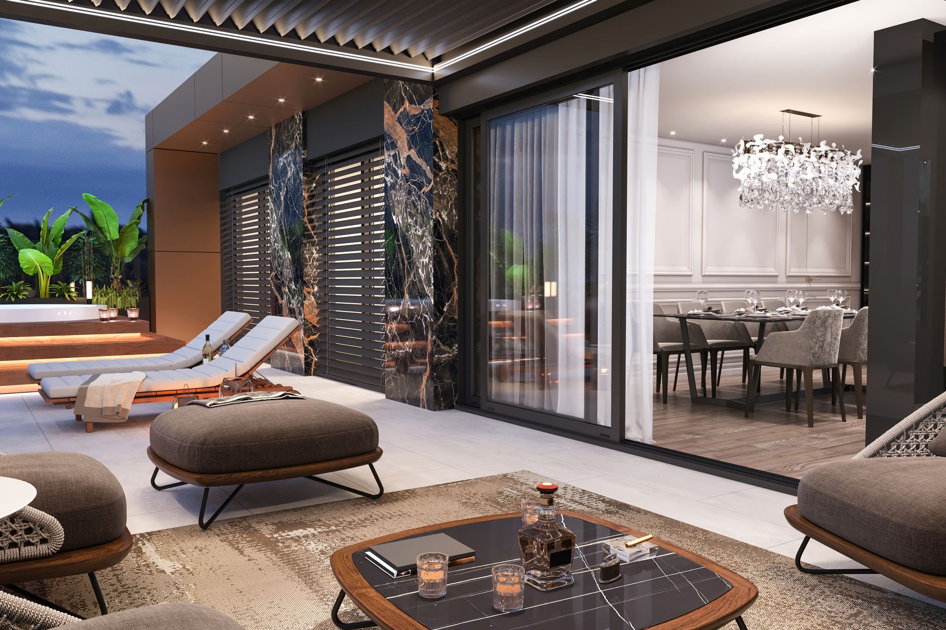 Modern patio with lounge chairs, low tables, and a dining area beside large sliding glass doors at dusk