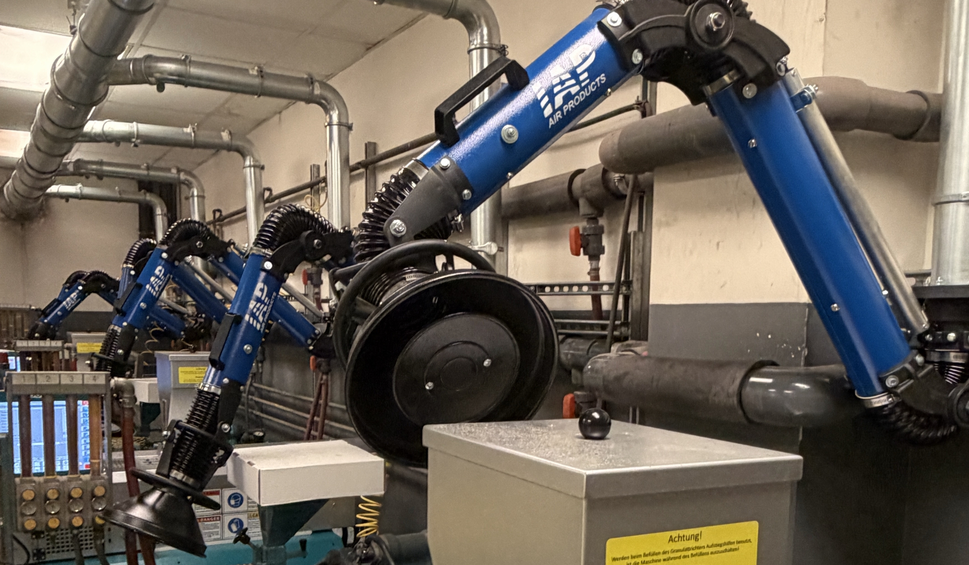Welding fume extraction arm in use to show source capture of fumes.