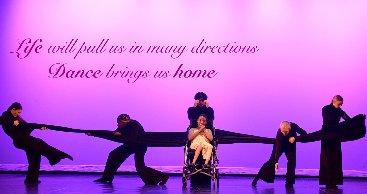 Purple stage with five dancers and central seated performer beneath the text “Dance brings us home”