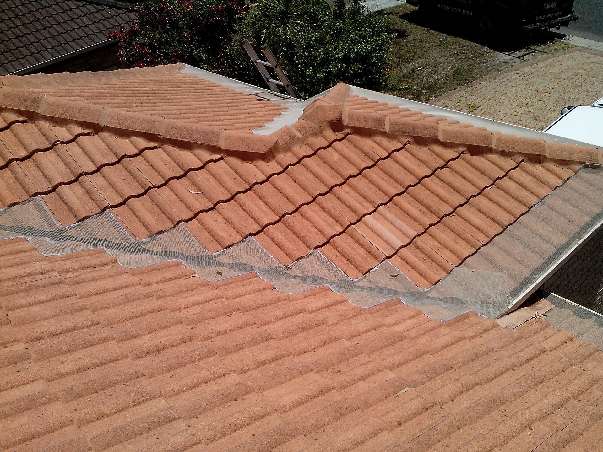 A Gutter With A Roof — Gold Coast Roof Repairs in Mudgeeraba, QLD