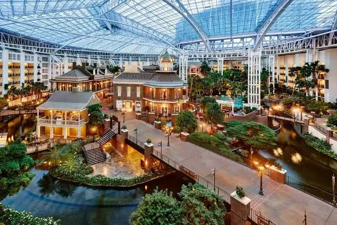 A large building with a lot of trees and buildings inside of it.