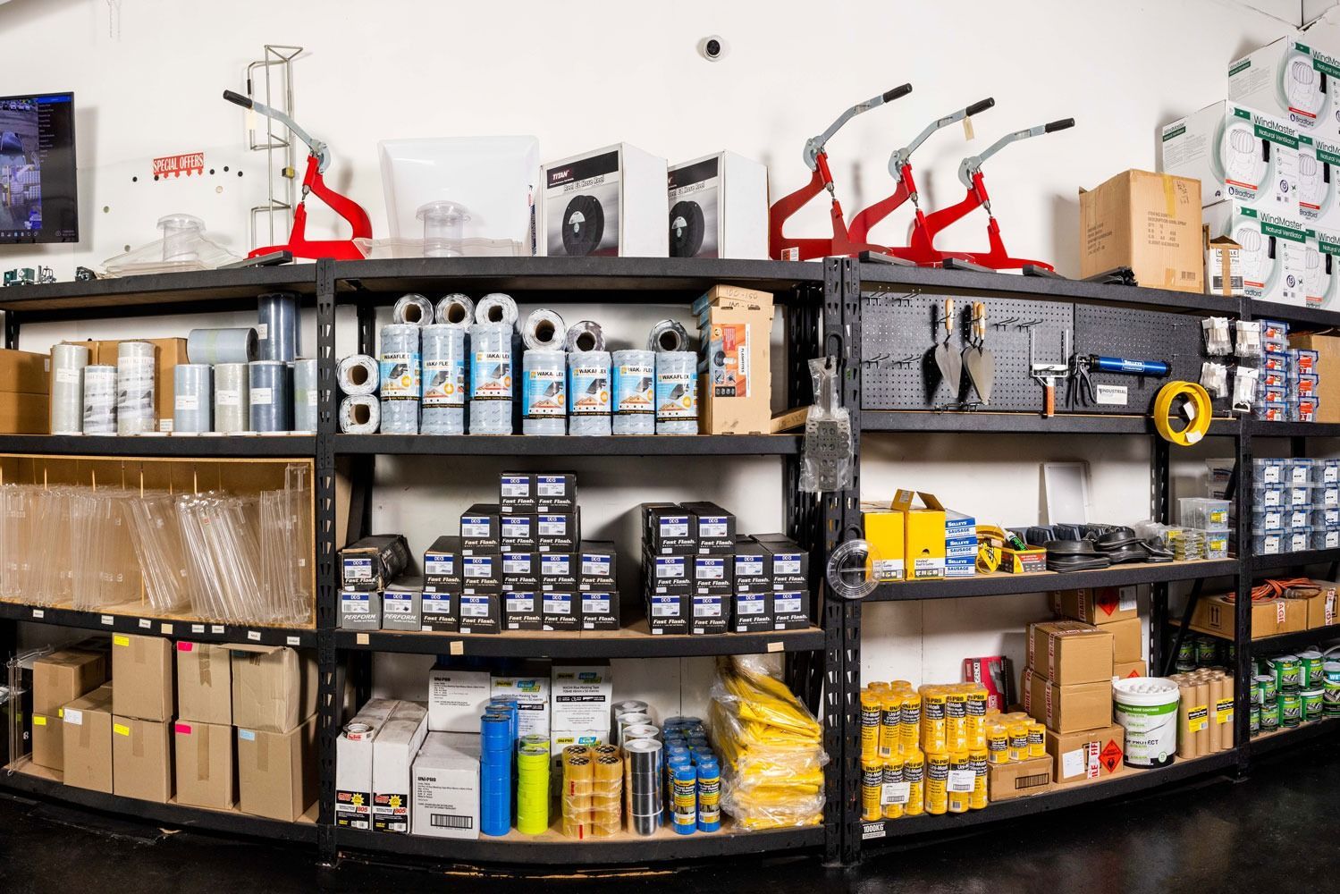 Shelves stocked with boxed and bottled goods in a retail store aisle