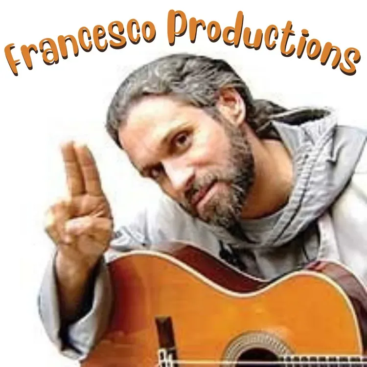 Man posing with guitar and raised fingers beside orange 