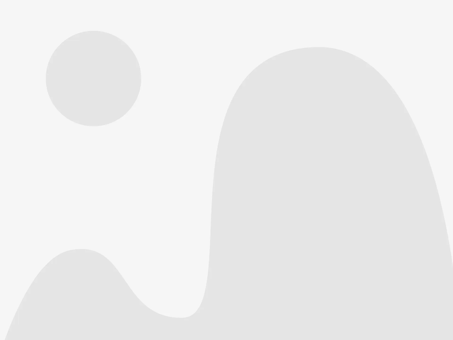 Abstract light gray silhouette on a white background, with a small circle and larger rounded shape
