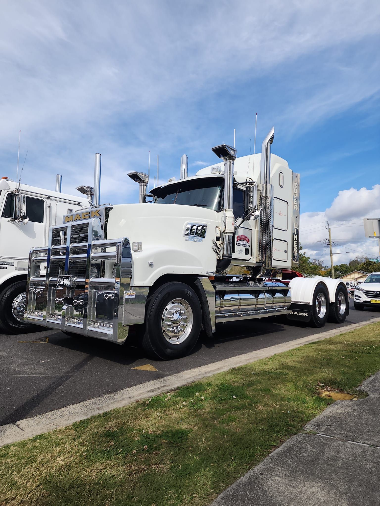 White Semi-Truck with Chrome Details Parked Beside a Road — Rainbow and Sons Heavy Haulage in Wells Crossing, NSW