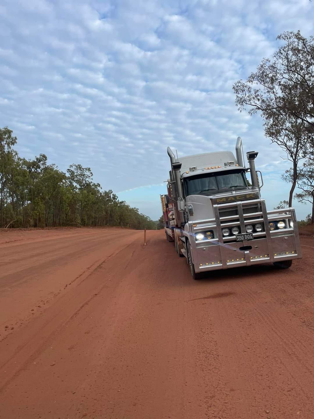 Large Silver Truck on A Red Dirt Road — Rainbow and Sons Heavy Haulage in Wells Crossing, NSW