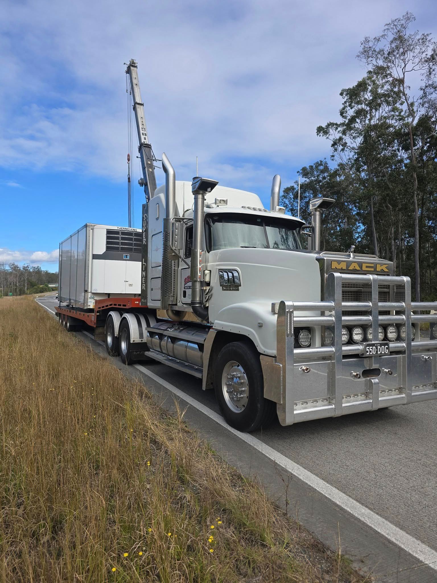 White Utility Truck Parked on Roadside Shoulder — Rainbow and Sons Heavy Haulage in Wells Crossing, NSW