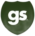 A green highway sign with the word gs on it.