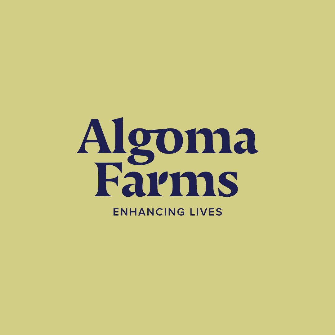 Algoma Farms logo in navy on a pale yellow background with the tagline “Enhancing Lives”