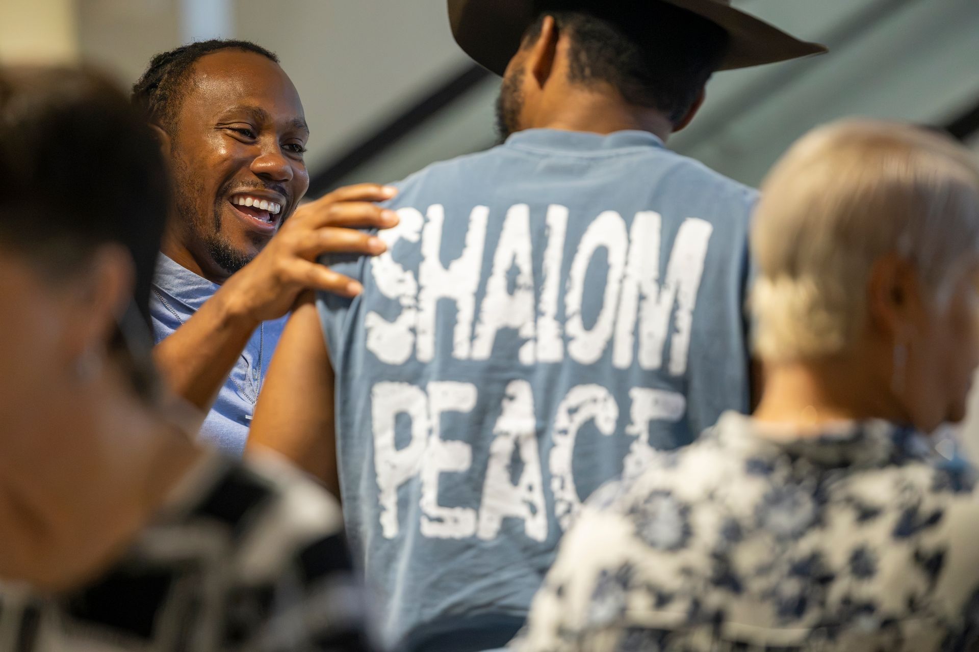 People laughing together at Faith Church
