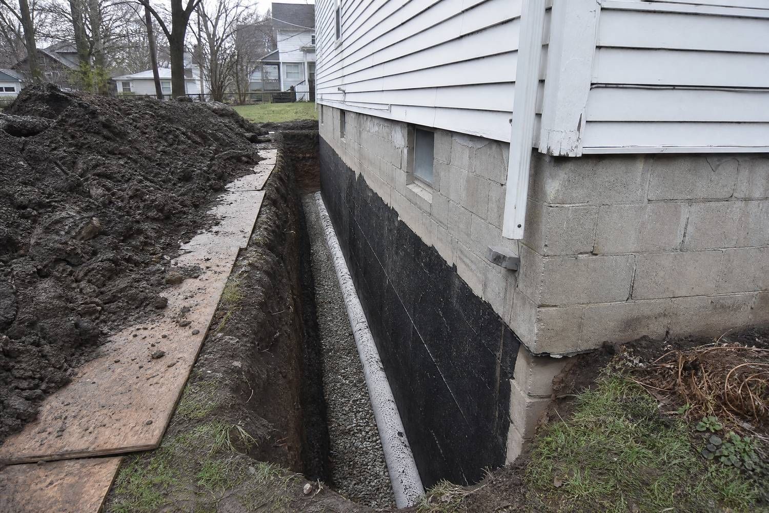 Exterior waterproofing excavation and French drain at a Lima, OH home