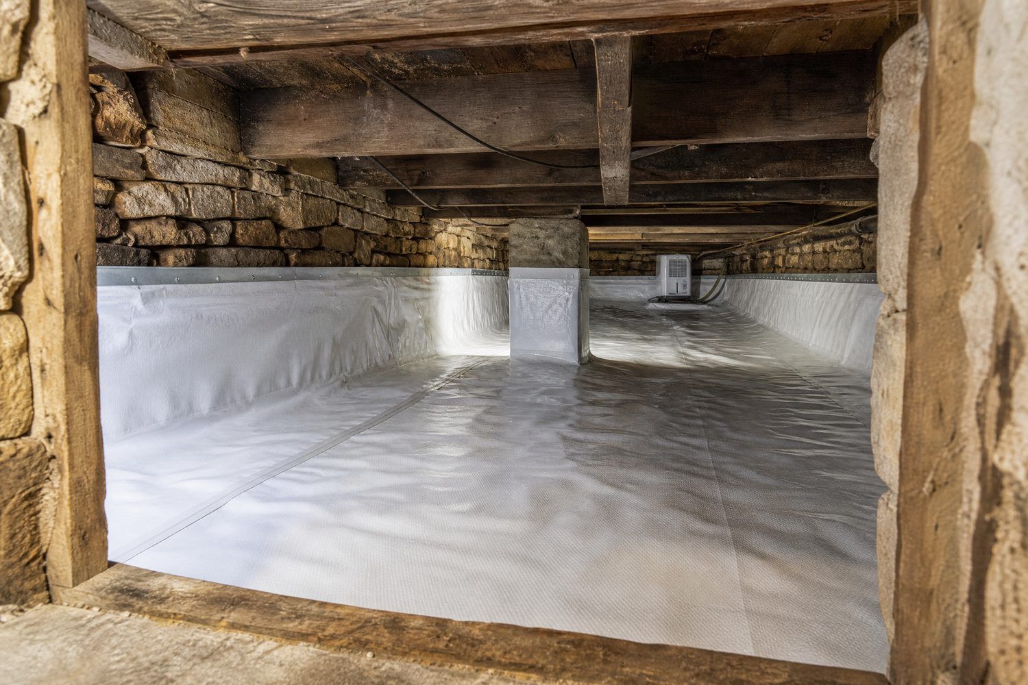 Crawl space encapsulation with sealed vapor barrier in Zanesville, OH